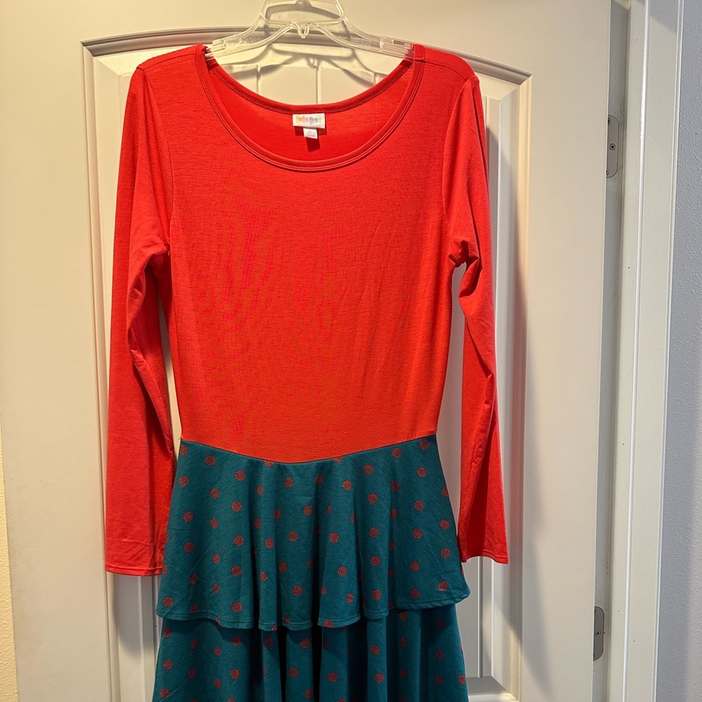 New without tags. Lularoe Georgia, large super cute midi dress with tiered skirt